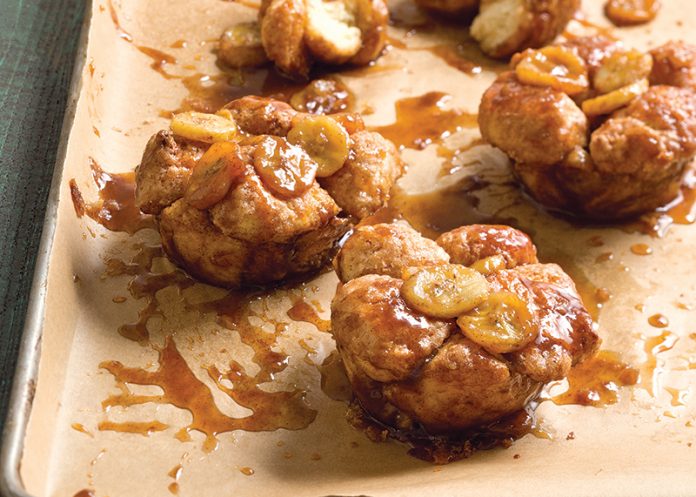 Bananas Foster Monkey Breads on brown parchment