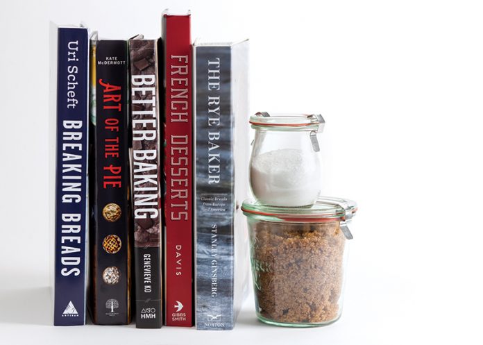 On the Shelf: Fall into Baking books stacked on white surface