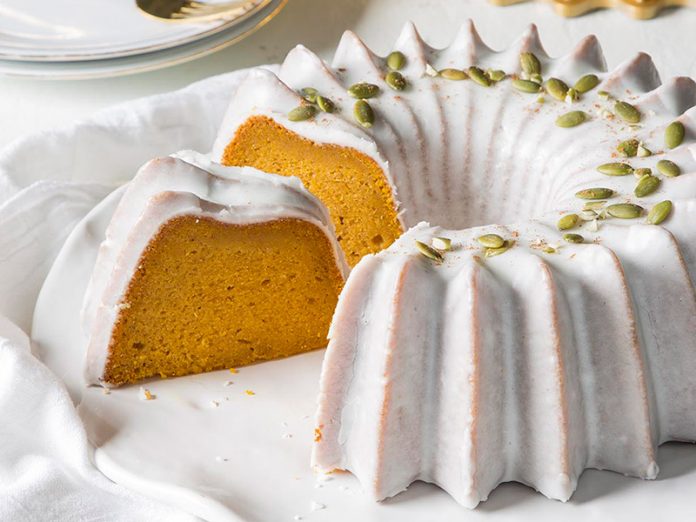 Pumpkin Mascarpone Bundt Cake sliced on white plate