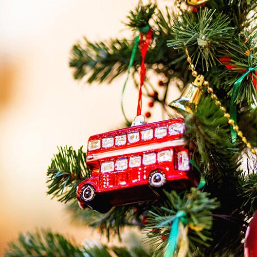 Double decker bus ornament in a Christmas tree