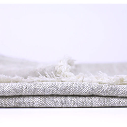 Stacked frayed linen hand towels