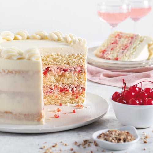 White frosted cherry cake